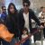 Can you caption this adorable photo of AbRam with SRK & Suhana
