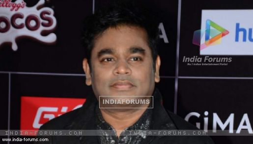 A R Rahman poses for the media at GIMA Awards