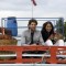 Neil and Bipasha sitting on a truck