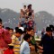 A hawker trades while tourists enjoy first day of New Year 2011 in Kolkata Maidan on Saturday. .