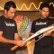 Cricketers M S Dhoni and Yuvraj Singh at a promotional event in New Delhi on Wed 2 Feb 2011. .
