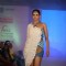 Model walks the ramp for WLC Chimera fashion show at Leela Hotel