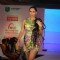 Model walks the ramp for WLC Chimera fashion show at Leela Hotel