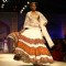 A model displays a creation by designer Manish Malhotra at the Wills Lifestyle India Fashion week 2012,in New Delhi on Friday. .