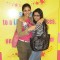 A still image of Deblina Chatterjee and her friend