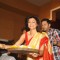 Sushmita Sen distributes prasad at Bombay Sarbojanin Durga Puja