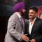 Navjot Singh Sidhu greets Suniel Shetty at Comedy Nights With Kapil