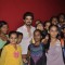 Saqib Saleem poses with children at the Promotion of Hawaa Hawaai