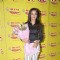 Surveen Chawla poses with a bouquet at the Promotion of Hate Story 2, at Radio Mirchi
