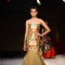 A model walks the ramp at the Indian Couture Week - Day 4