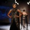 A model walks the ramp at the Indian Couture Week - Day 4