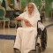 Devki Nanawati sitting on a wheel chair