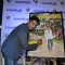 Rajeev Khandelwal signs his Autograph on the Travel Magazine Poster
