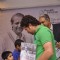 Sachin Tendulkar greets a young fan at Durgapur Tribute Book Launch