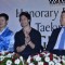 Tiger Shroff gives a smiling pose for the camera