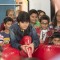 Bhavya Gandhi plays a game of Air Soccer at the Launch of the 10th Planet-Happy Planet with Smilo
