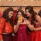 Parvathy Omanakuttan and Daisy Shah pose for a selfie with a fan