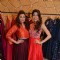 Parvathy Omanakuttan and Daisy Shah pose for the media at Hue Store