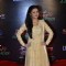 Devoleena Bhattacharjee poses for the media at the Grand Finale of Pro Kabbadi League