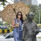 Neha Dhupia with the comman man's statue of R.K. Laxman