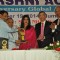 Priyanka Chopra receives a Trophy at Priyadarshini Academy Global Awards 2014