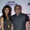 Zeba Kohli poses with her husband at the Launch of Planet Hollywood