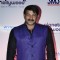 Manoj Tiwari poses for the media at the Launch of Planet Hollywood