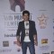 Mohit Marwah poses for the media at the Closing Ceremony of 16th MAMI Film Festival