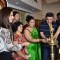 Tanishaa Mukerji and Rishi Kapoor light the lamp at a Special Art Show Preview