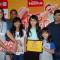 Kiku Sharda poses with children at Big FM Event