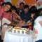 Kiku Sharda cuts the cake with children at Big FM Event