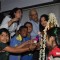 Aishwarya Rai Bachchan lights the lamp with children at Smile Train Organisation