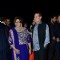 Salim Khan and Helen pose for the media at Arpita Khan's Wedding Reception