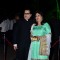 Ramesh Taurani poses with wife at Arpita Khan's Wedding Reception