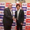 Shah Rukh Khan shakes hands with an official of DHFL