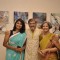 Amol Palekar poses with his wife and daughter at the Art Exhibition