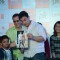 Aamir Khan interacts with a young fan at P.K. Game Launch