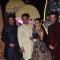 Manish and Punit Malhotra pose with the newly wedded couple Riddhi Malhotra and Tejas Talwalkar