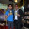 Ayan Mukerji poses with a guest at the Book Launch of 'The True Story of Sun Burn'