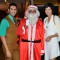 Sandip Soparkar and Jessy Randhawa pose with Santa Claus at their Christmas Bash