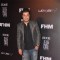 Varun Sharma poses for the media at FHM Bachelor of the Year Bash