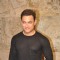 Aamir Khan poses for the media at the Special Screening of P.K. for Sanjay Dutt