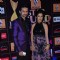 Varunn Jain and Pooja Singh pose for the media at Star Guild Awards