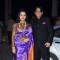 Padmini Kolhapure poses with husband at Kush Sinha's Wedding Reception