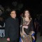 Mukesh Ambani and Nita Ambani pose for the media at Hinduja Bash