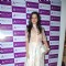 Amy Billimoria poses for the media at About Face Salon Launch