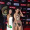 Neha Kakkar poses with a friend at GIMA Awards 2015
