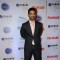 Angad Bedi poses for the media at Filmfare Glamour and Style Awards