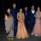 Tulsi Kumar poses with her family members at her Wedding Reception