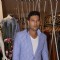 Yuvraj Singh poses for the media at Narendra Kumar's Store Launch